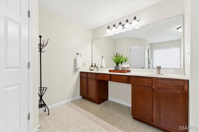334 Lauren Lndg, Ballwin, MO 63021 - bathroom with double vanity and baseboards