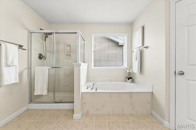 334 Lauren Lndg, Ballwin, MO 63021 - full bathroom featuring a stall shower, a bath, and tile patterned flooring