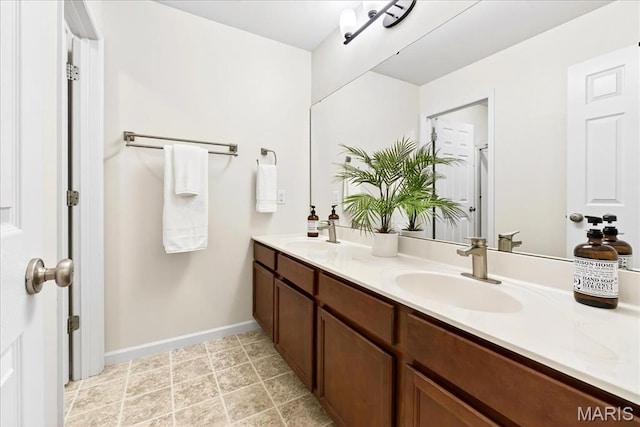 334 Lauren Lndg, Ballwin, MO 63021 - bathroom featuring double vanity and baseboards