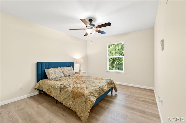 334 Lauren Lndg, Ballwin, MO 63021 - bedroom with light wood-type flooring and a ceiling fan