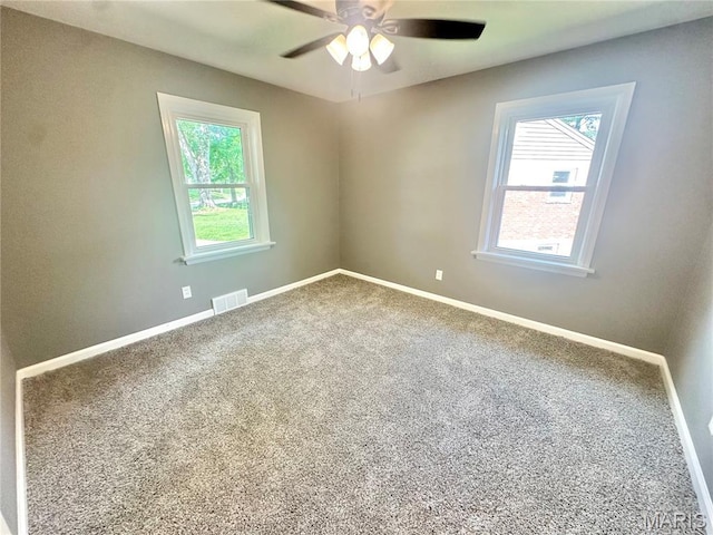 1226 Oakleaf Dr, Saint Louis, MO 63119 - empty room with a ceiling fan and carpet floors