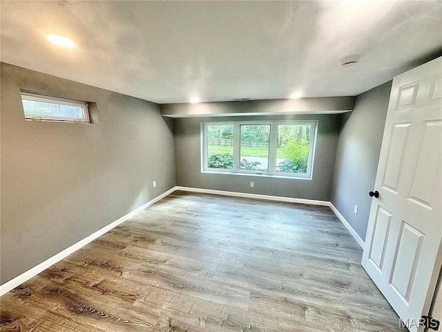1226 Oakleaf Dr, Saint Louis, MO 63119 - empty room with baseboards and wood finished floors