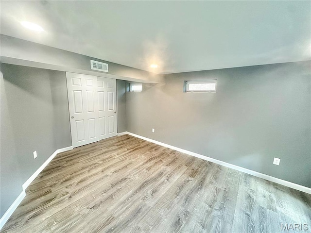 1226 Oakleaf Dr, Saint Louis, MO 63119 - basement featuring baseboards and wood finished floors