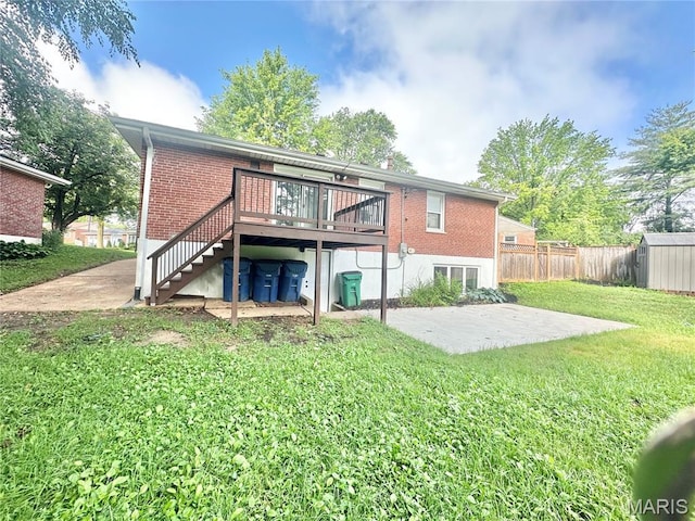 1226 Oakleaf Dr, Saint Louis, MO 63119 - back of house with stairs, a wooden deck, brick siding, a patio, and a storage shed