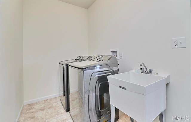 17603 Hitching Post Ct, Eureka, MO 63025 - washroom with washer and dryer and baseboards