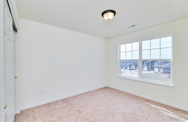 17603 Hitching Post Ct, Eureka, MO 63025 - carpeted empty room featuring baseboards
