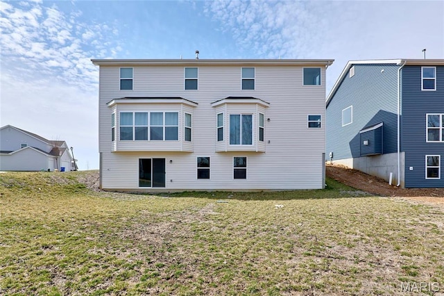 17603 Hitching Post Ct, Eureka, MO 63025 - rear view of house featuring a lawn