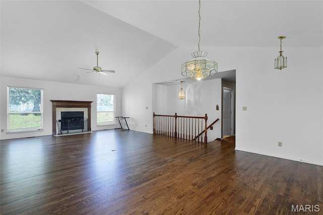 3816 Keeneland Ct, Florissant, MO 63034 - unfurnished living room with a ceiling fan, wood finished floors, a fireplace with flush hearth, and high vaulted ceiling