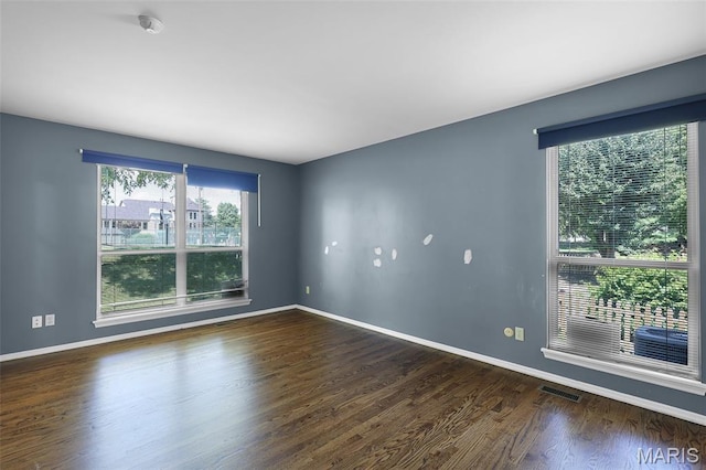 3816 Keeneland Ct, Florissant, MO 63034 - spare room with wood finished floors and baseboards