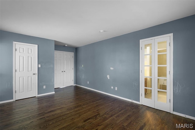 3816 Keeneland Ct, Florissant, MO 63034 - empty room featuring baseboards and dark wood finished floors