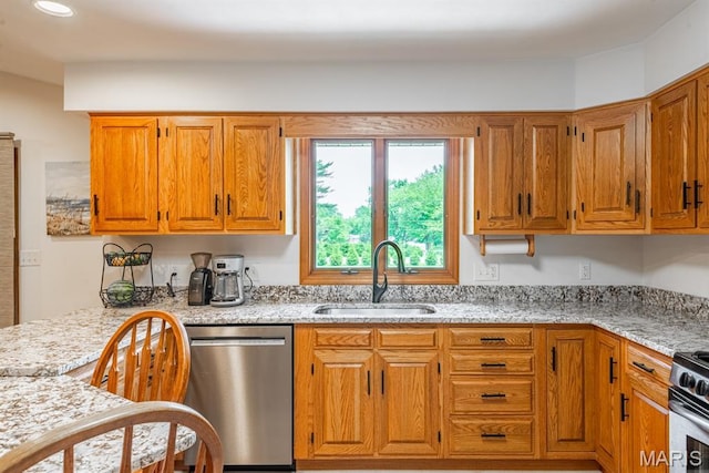 616 E Brentmoor Dr, Troy, IL 62294 - kitchen with stainless steel appliances, light stone counters, and brown cabinets