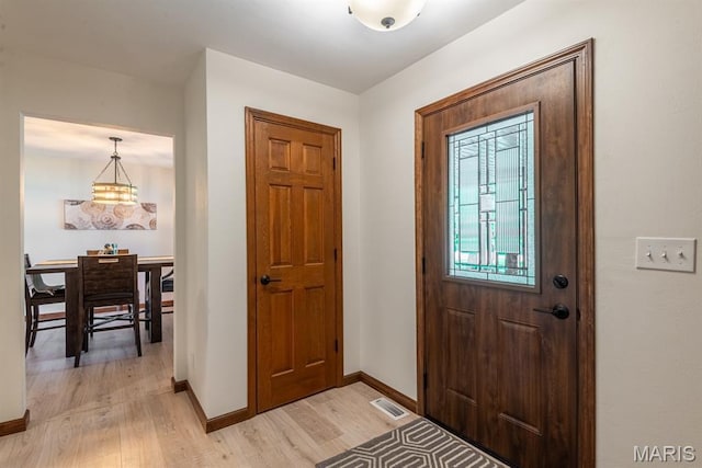 616 E Brentmoor Dr, Troy, IL 62294 - entrance foyer featuring light wood finished floors and baseboards