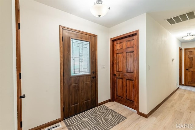 616 E Brentmoor Dr, Troy, IL 62294 - foyer entrance with light wood-style flooring and baseboards
