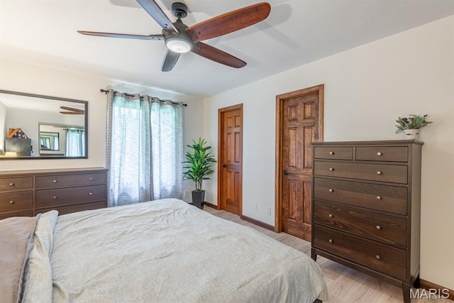 616 E Brentmoor Dr, Troy, IL 62294 - bedroom with light wood-style floors and ceiling fan