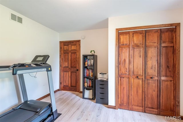 616 E Brentmoor Dr, Troy, IL 62294 - exercise room with light wood-style flooring