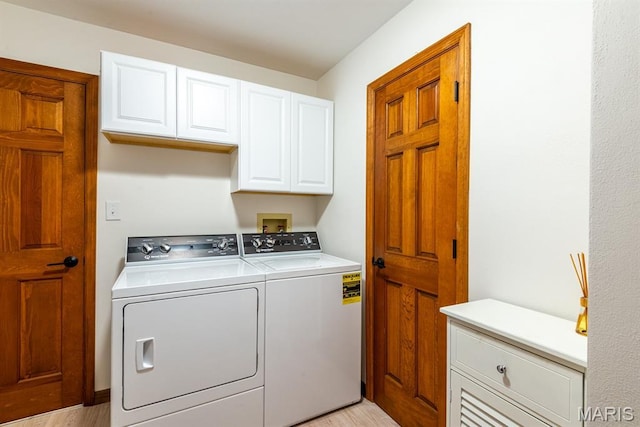 616 E Brentmoor Dr, Troy, IL 62294 - laundry area featuring cabinet space, washer and dryer, and light wood finished floors