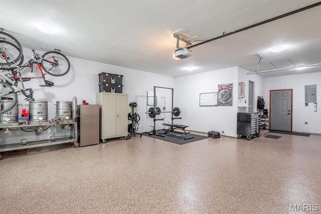 616 E Brentmoor Dr, Troy, IL 62294 - garage featuring a garage door opener and electric panel