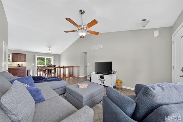 40 Valley Farms Dr, Winfield, MO 63389 - living room with wood finished floors, lofted ceiling, and ceiling fan