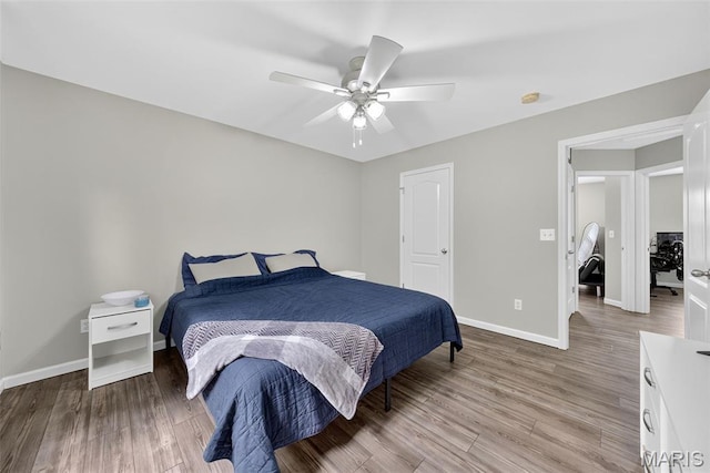 40 Valley Farms Dr, Winfield, MO 63389 - bedroom with light wood-style floors and ceiling fan