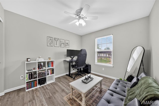 40 Valley Farms Dr, Winfield, MO 63389 - home office with wood finished floors and a ceiling fan