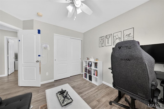 40 Valley Farms Dr, Winfield, MO 63389 - office with a ceiling fan and wood finished floors