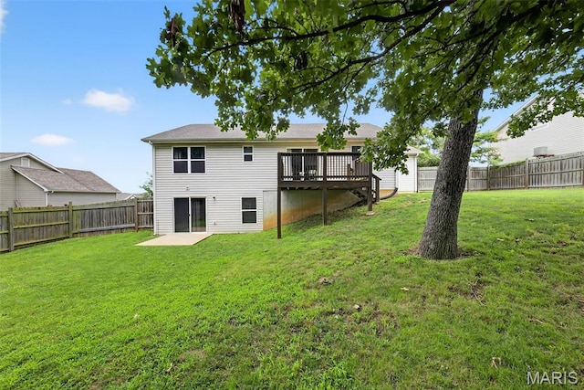 40 Valley Farms Dr, Winfield, MO 63389 - back of house with a fenced backyard and a wooden deck