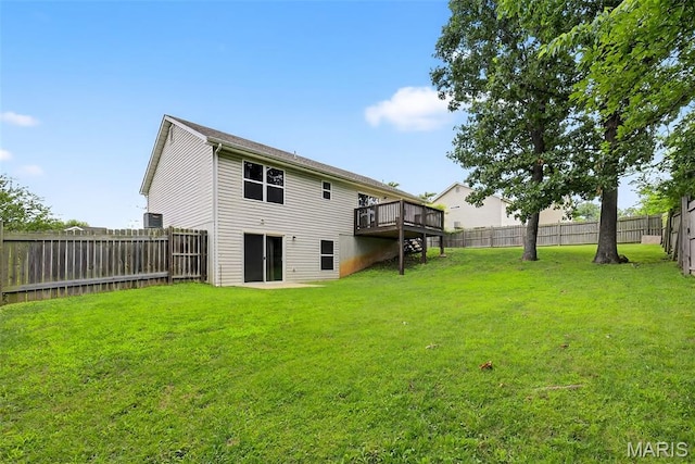 40 Valley Farms Dr, Winfield, MO 63389 - back of house with a fenced backyard and a wooden deck