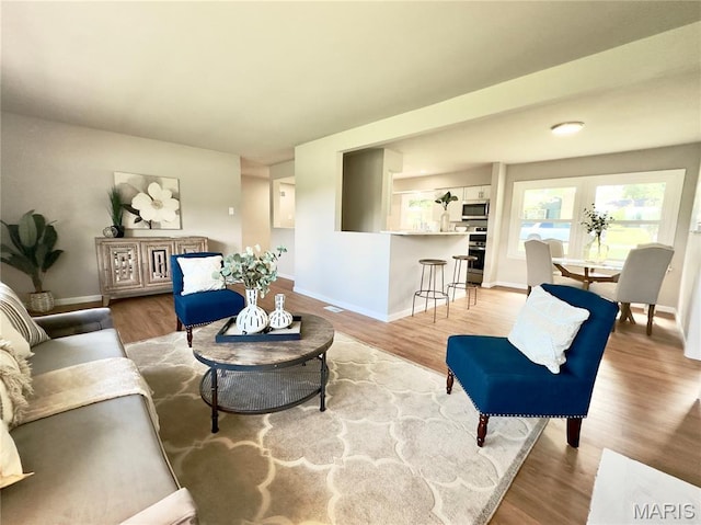1248 Lynchester Ln, Kirkwood, MO 63122 - living room with wood finished floors and baseboards