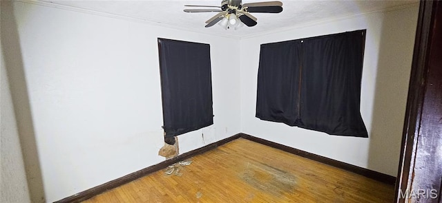601 Chanslor, Ferguson, MO 63135 - spare room featuring wood finished floors, ornamental molding, and ceiling fan
