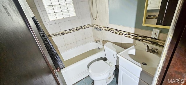 601 Chanslor, Ferguson, MO 63135 - full bath with vanity, shower / bathtub combination, and tile walls