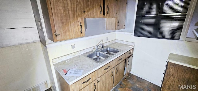 601 Chanslor, Ferguson, MO 63135 - kitchen featuring light countertops and dark stone finish flooring
