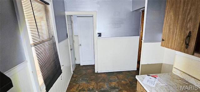 601 Chanslor, Ferguson, MO 63135 - corridor featuring stone finish flooring and wainscoting