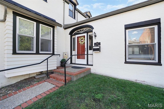 401 Elm St, Washington, MO 63090 - property entrance featuring a lawn