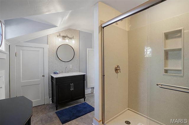 401 Elm St, Washington, MO 63090 - bathroom with a stall shower, vanity, and lofted ceiling