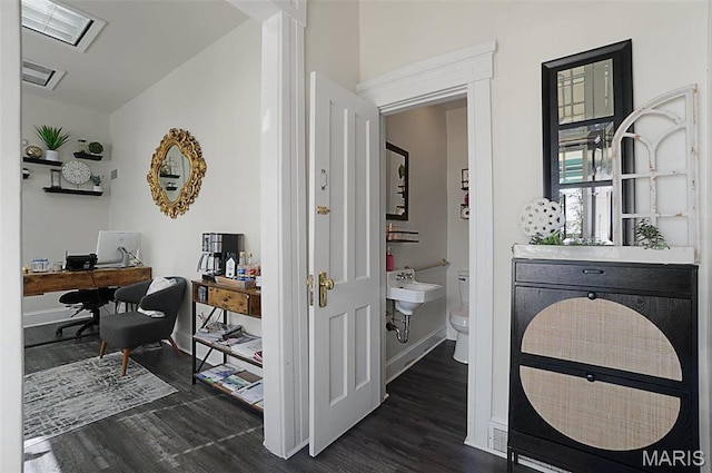 401 Elm St, Washington, MO 63090 - bathroom featuring wood finished floors and toilet