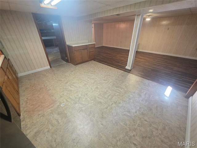 132 Linn Dr, Saint Genevieve, MO 63670 - finished basement with wooden walls and wood finished floors