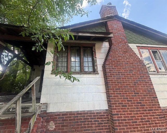 1625 N 46th St E, St Louis, IL 62204 - view of home's exterior featuring a chimney