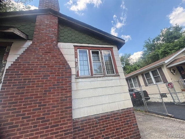 1625 N 46th St E, St Louis, IL 62204 - view of side of home with a chimney