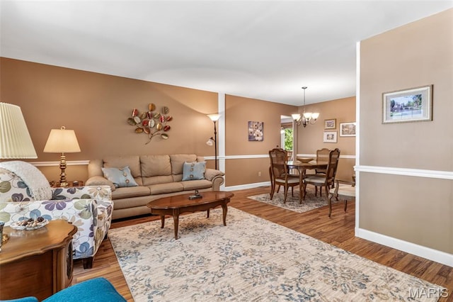5028 Baldcypress Ct, Saint Louis, MO 63128 - living area with a chandelier and wood finished floors