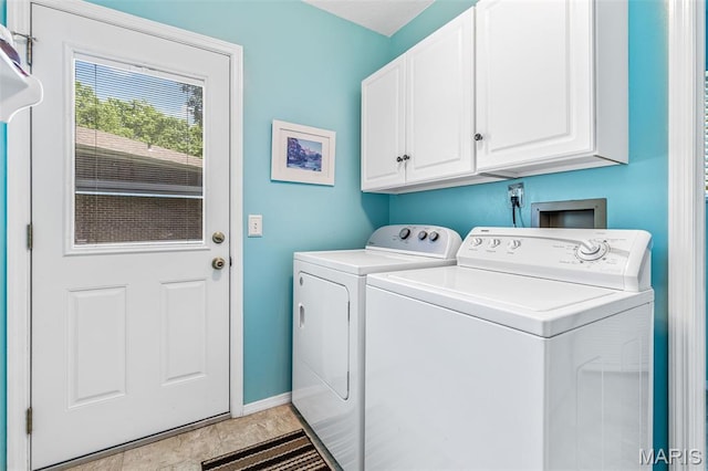 5028 Baldcypress Ct, Saint Louis, MO 63128 - washroom with washing machine and clothes dryer and cabinet space