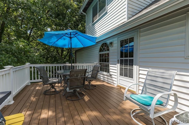 5028 Baldcypress Ct, Saint Louis, MO 63128 - wooden deck featuring outdoor dining area