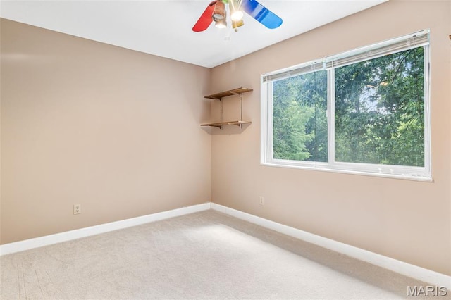 5028 Baldcypress Ct, Saint Louis, MO 63128 - spare room featuring ceiling fan and carpet