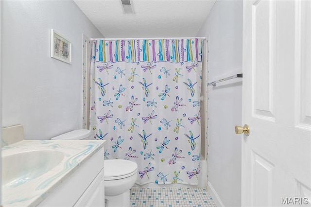 5028 Baldcypress Ct, Saint Louis, MO 63128 - full bath featuring vanity, shower / tub combo with curtain, a textured ceiling, and tile patterned floors