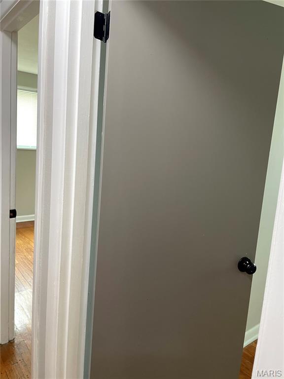 9264 Bellefontaine Rd, Bellefontaine Nghbrs, MO 63137 - detailed view of wood finished floors