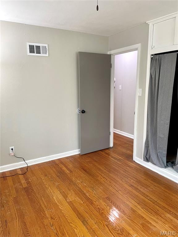 9264 Bellefontaine Rd, Bellefontaine Nghbrs, MO 63137 - unfurnished bedroom featuring light wood finished floors and baseboards
