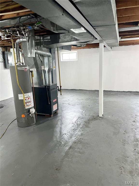 9264 Bellefontaine Rd, Bellefontaine Nghbrs, MO 63137 - below grade area featuring water heater and heating unit