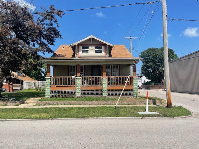 116 N Hesperia St Unit 1, Collinsville, IL 62234 - bungalow-style home featuring a porch and driveway