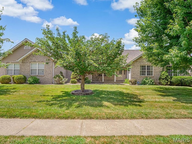 22 Foxmoor Dr, Maryville, IL 62062 - view of front of property with brick siding and a front yard