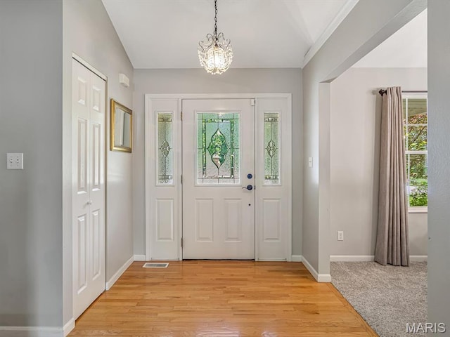 22 Foxmoor Dr, Maryville, IL 62062 - entryway featuring a chandelier and light wood-style flooring
