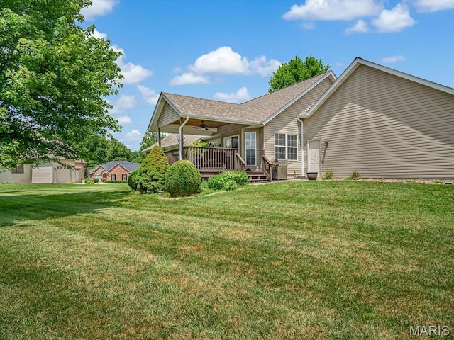 22 Foxmoor Dr, Maryville, IL 62062 - rear view of property with ceiling fan, a lawn, a deck, and roof with shingles